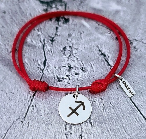Bransoletka-zawieszka-stalowa-na-sznurku-ze-znakiem-zodiaku