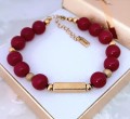 Bransoletka-z-czerwonego-korala-z-personalizowanym-slupkiem-stal