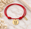 Bransoletka-stalowa-na-sznurku-znak-zodiaku-zloty
